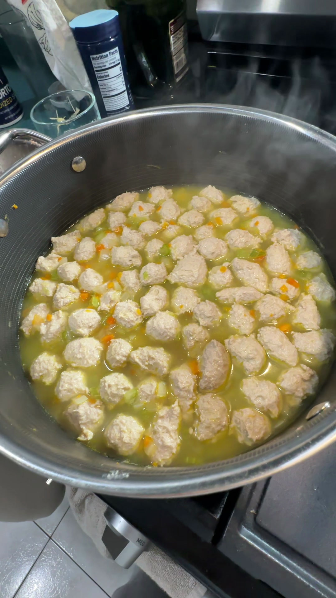 Add the broth and meatballs 