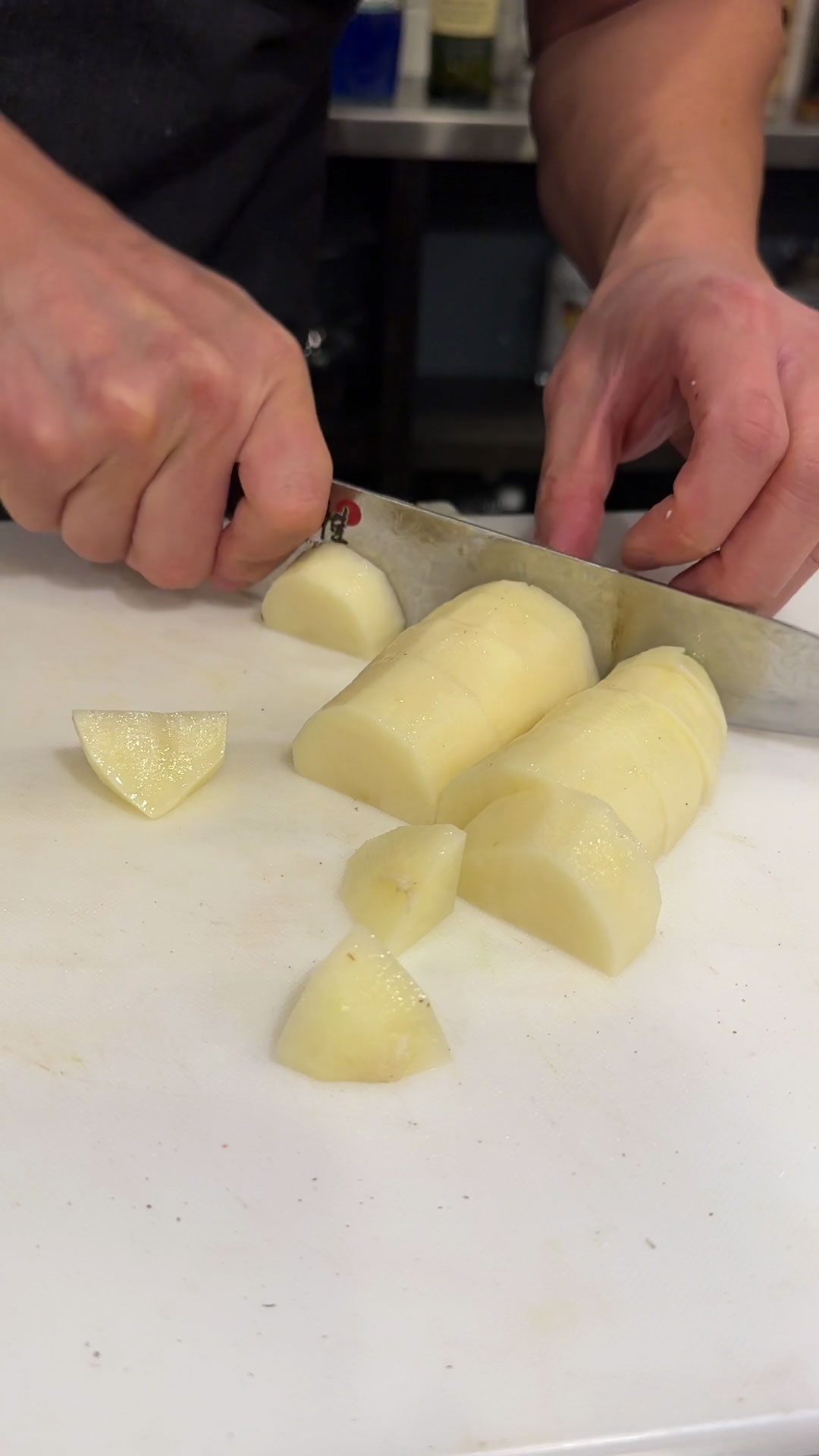 Peel then chop the potatoes 