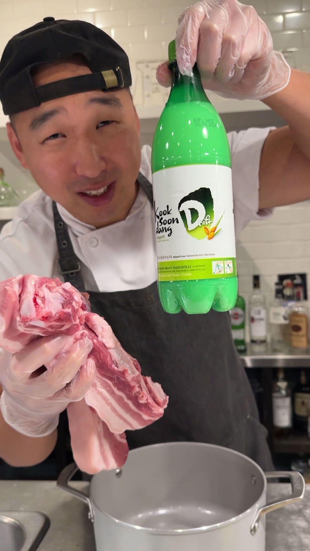 Chef Chris Cho making Makgeolli-braised pork belly 