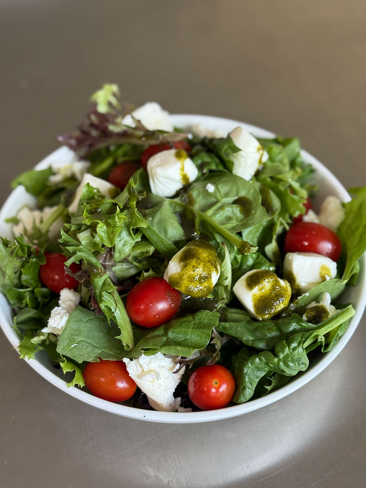 Perilla dressing over salad 