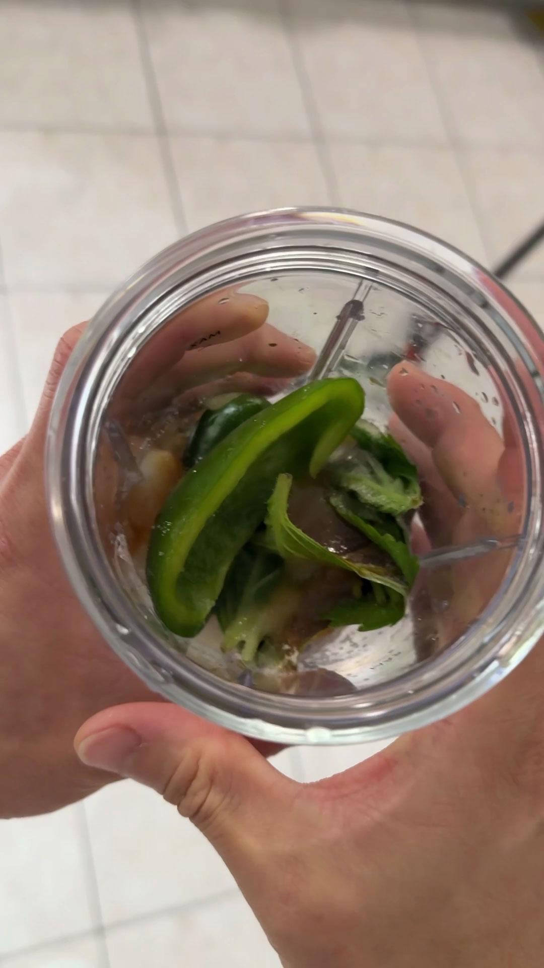 Combine perilla leaves, green bell pepper, jalapeño, garlic, soy sauce, apple vinegar, sugar, and lime juice