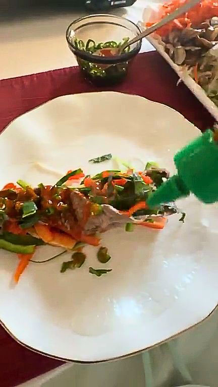 Place the veggies and meat in the middle of rice paper 