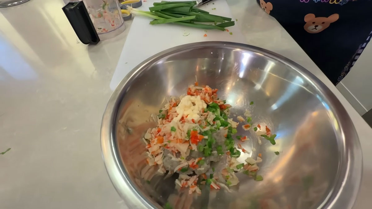 Season the shrimp mixture with mayo, salt, and pepper