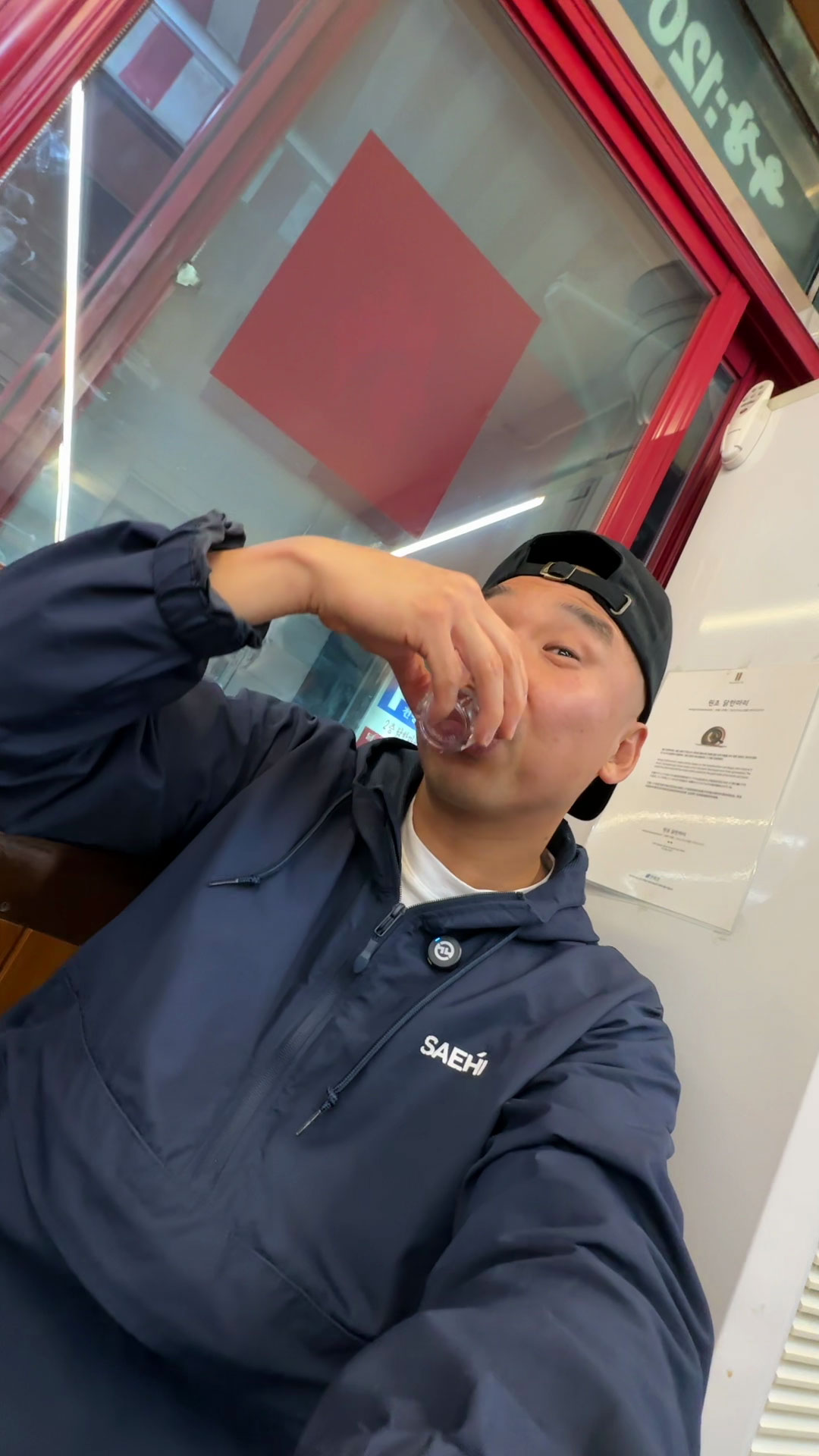 Chef Chris Cho enjoying soju 