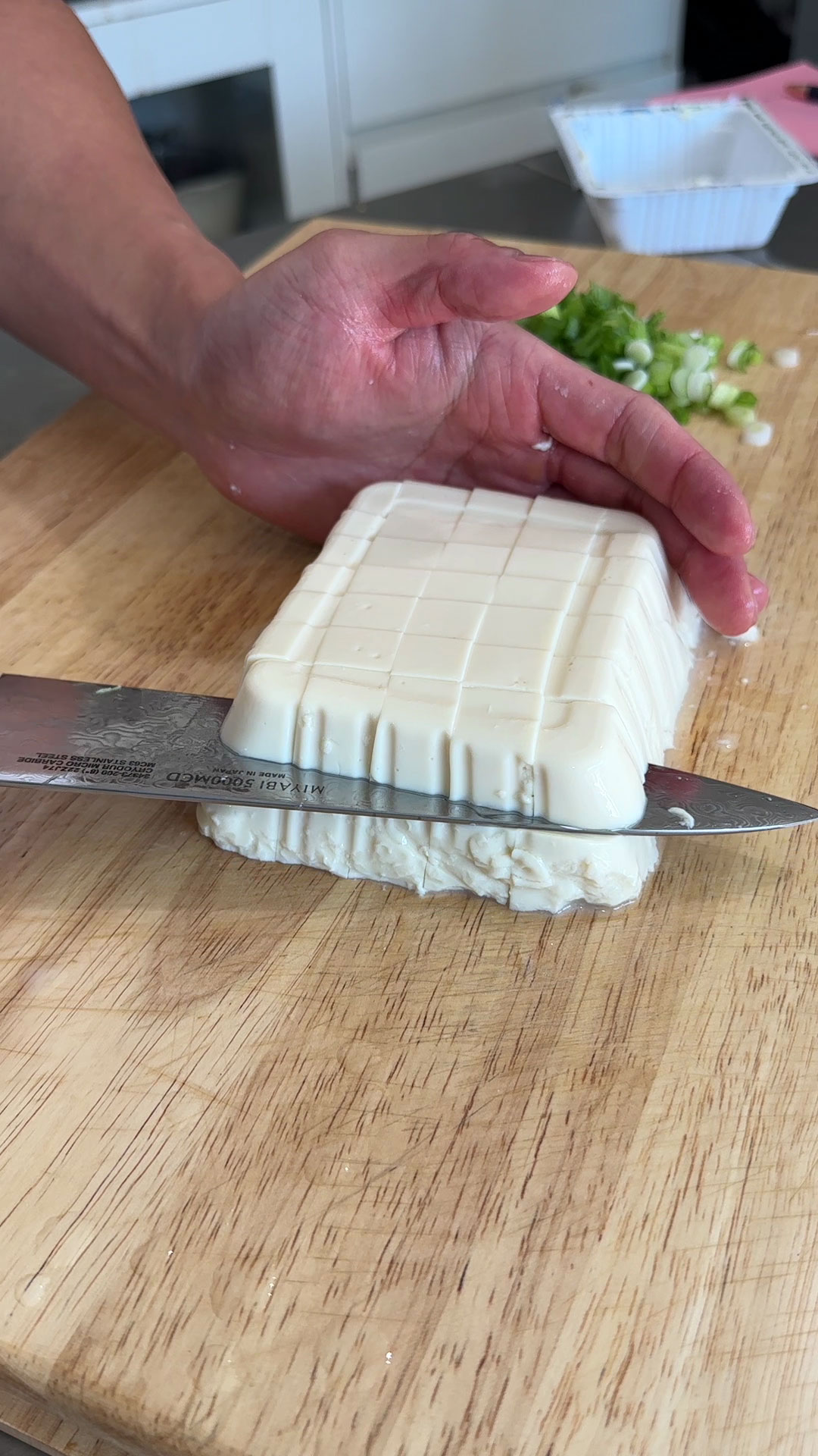 Chop the scallions and cube the silken tofu 
