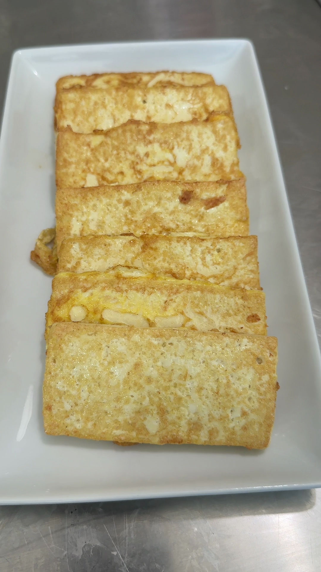 Golden brown pan fried tofu