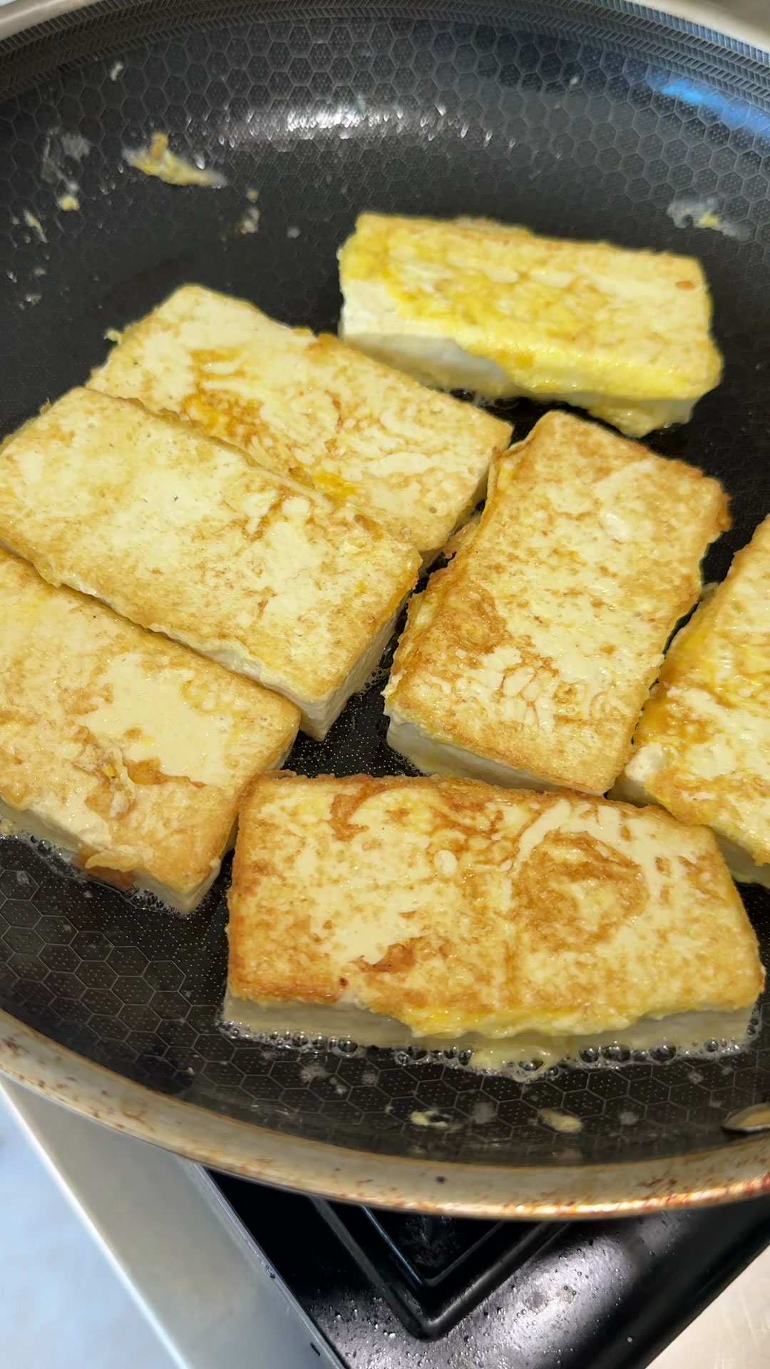 Golden brown pan fried tofu