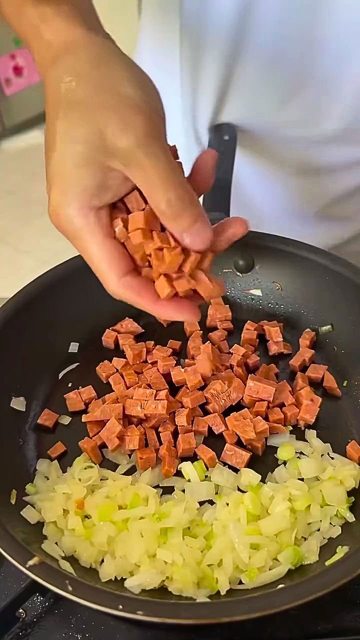 Saute the onion, scallions, and spam
