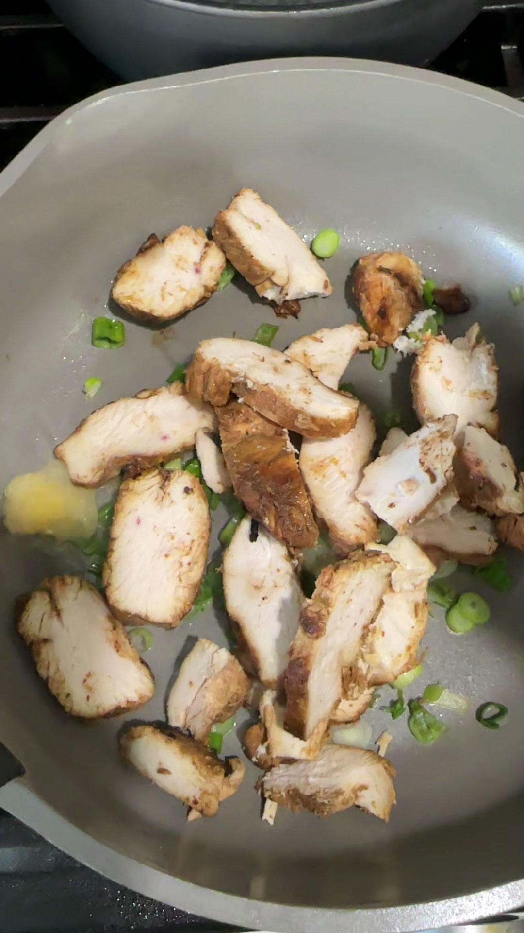 Saute the green onion and chicken
