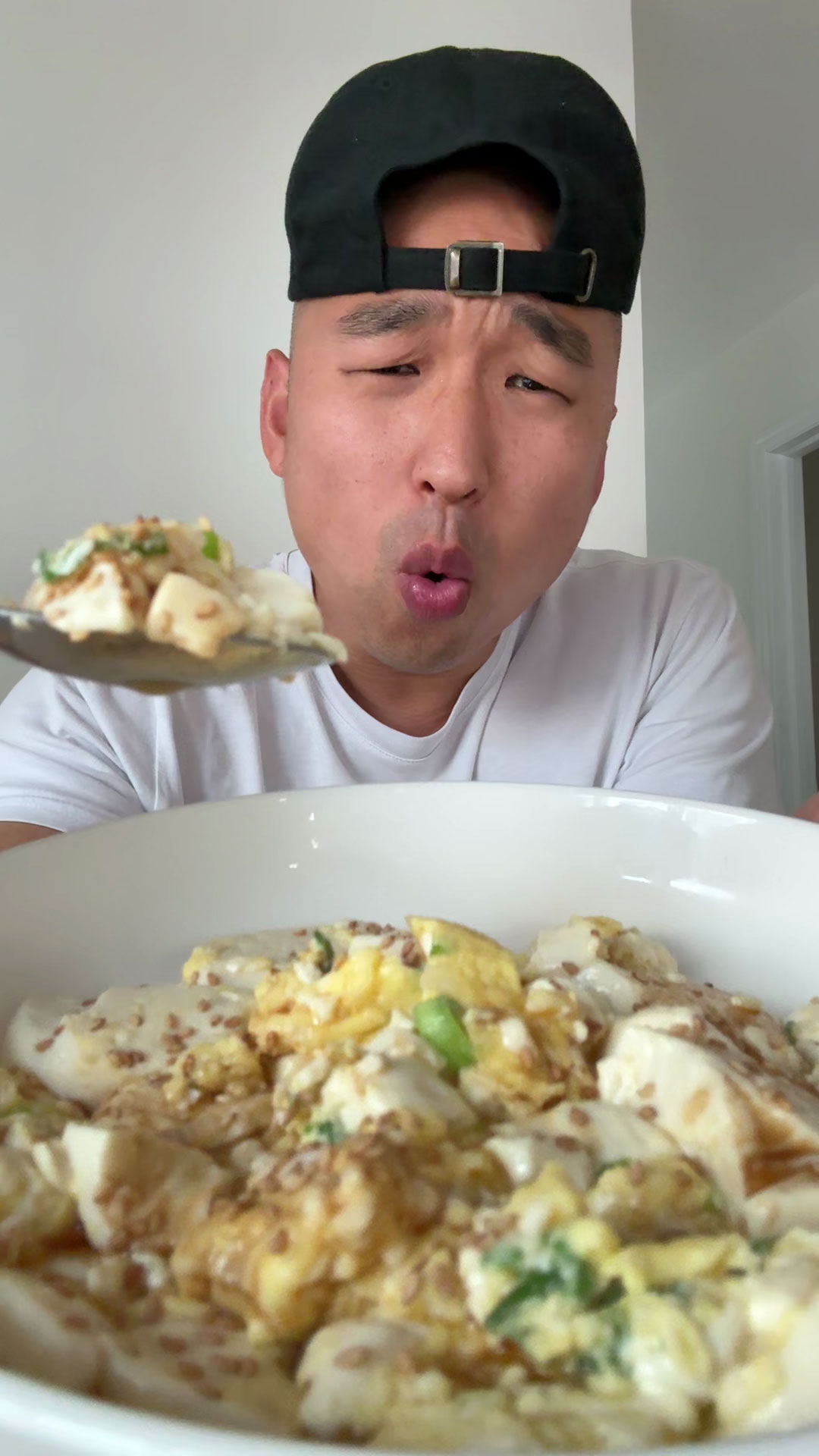 Chef Chris Cho making Eggs and Tofu