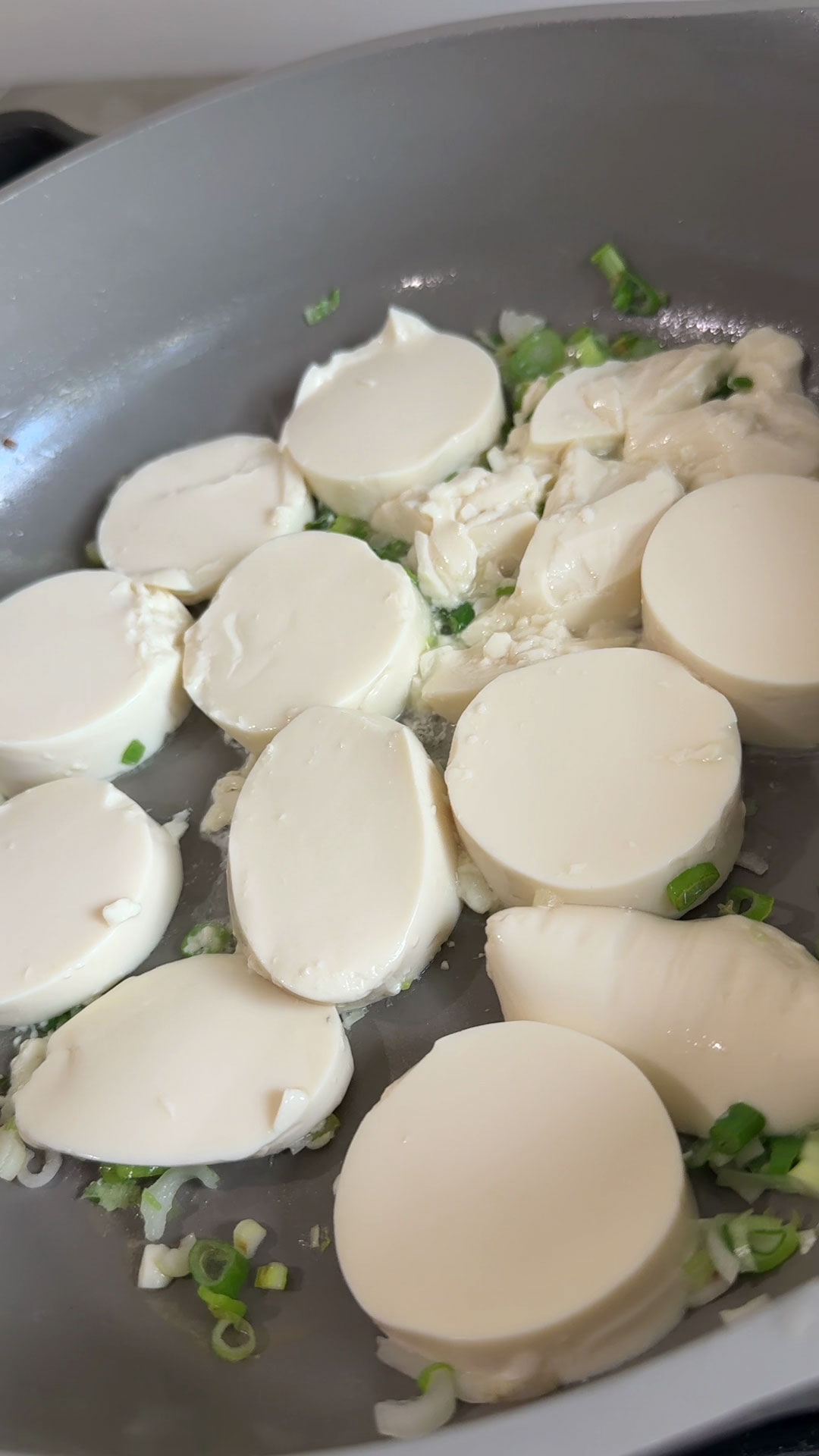 Add the tofu into the pan