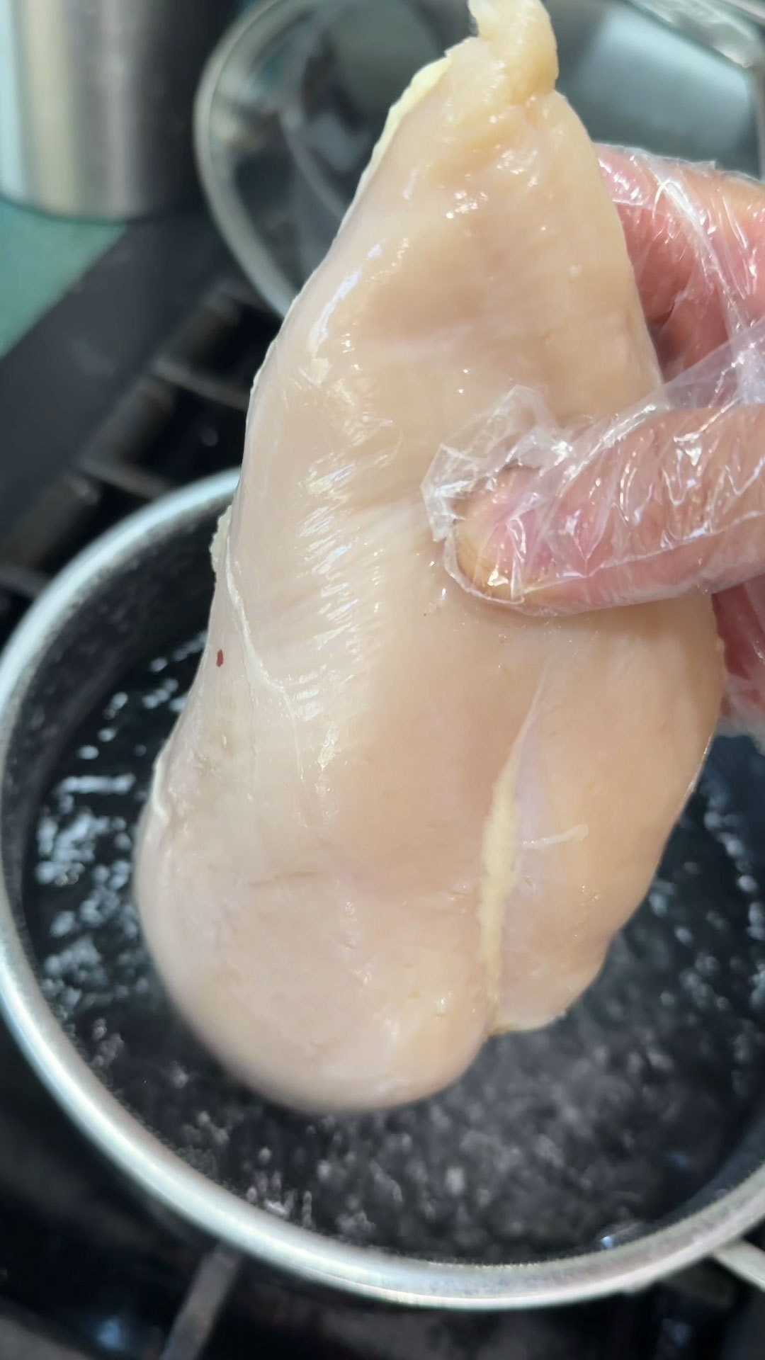 Add chicken to the rapid boiling water