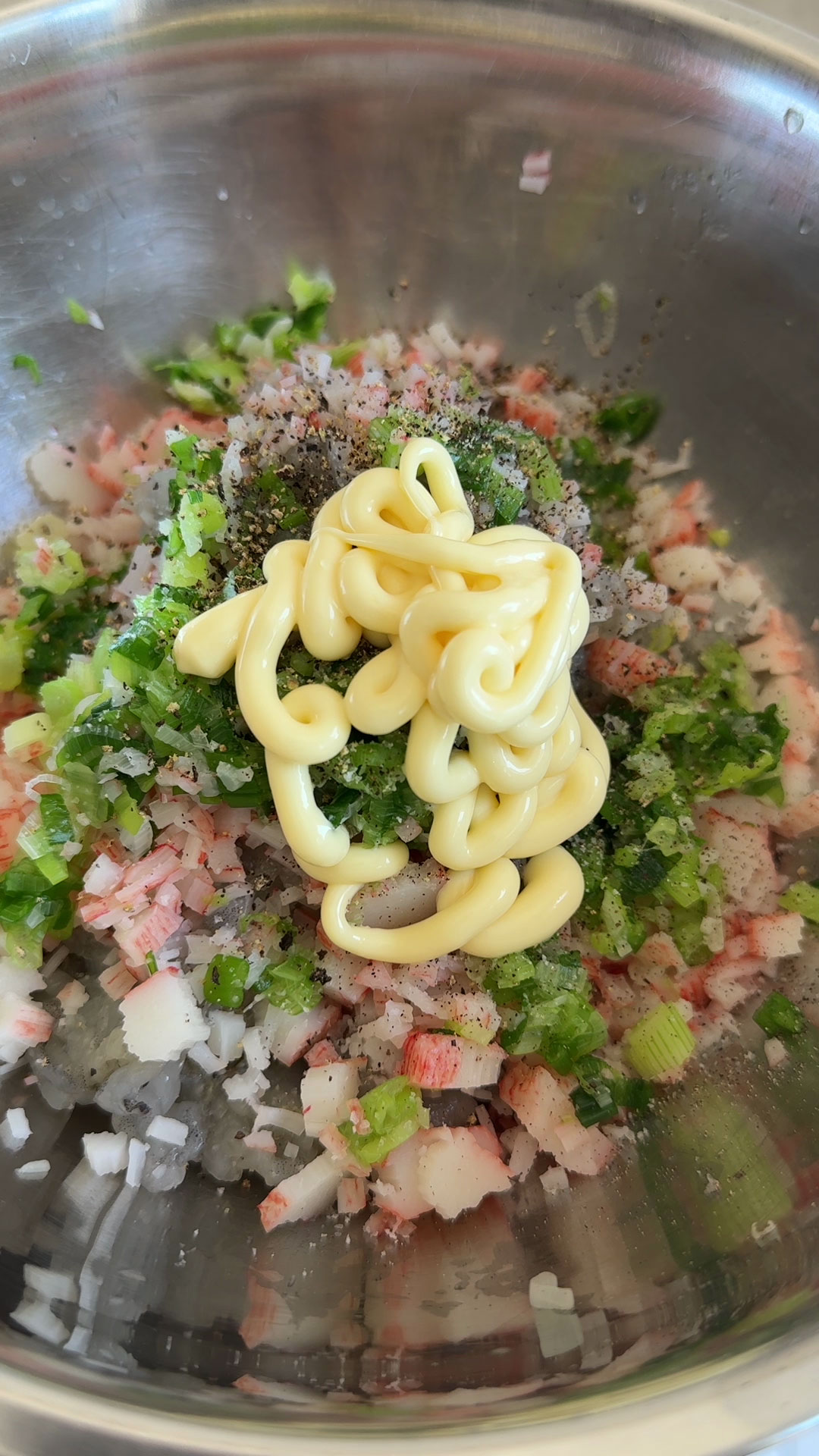 Combine shrimp, imitation crab, scallions, salt, pepper, and Japanese mayo
