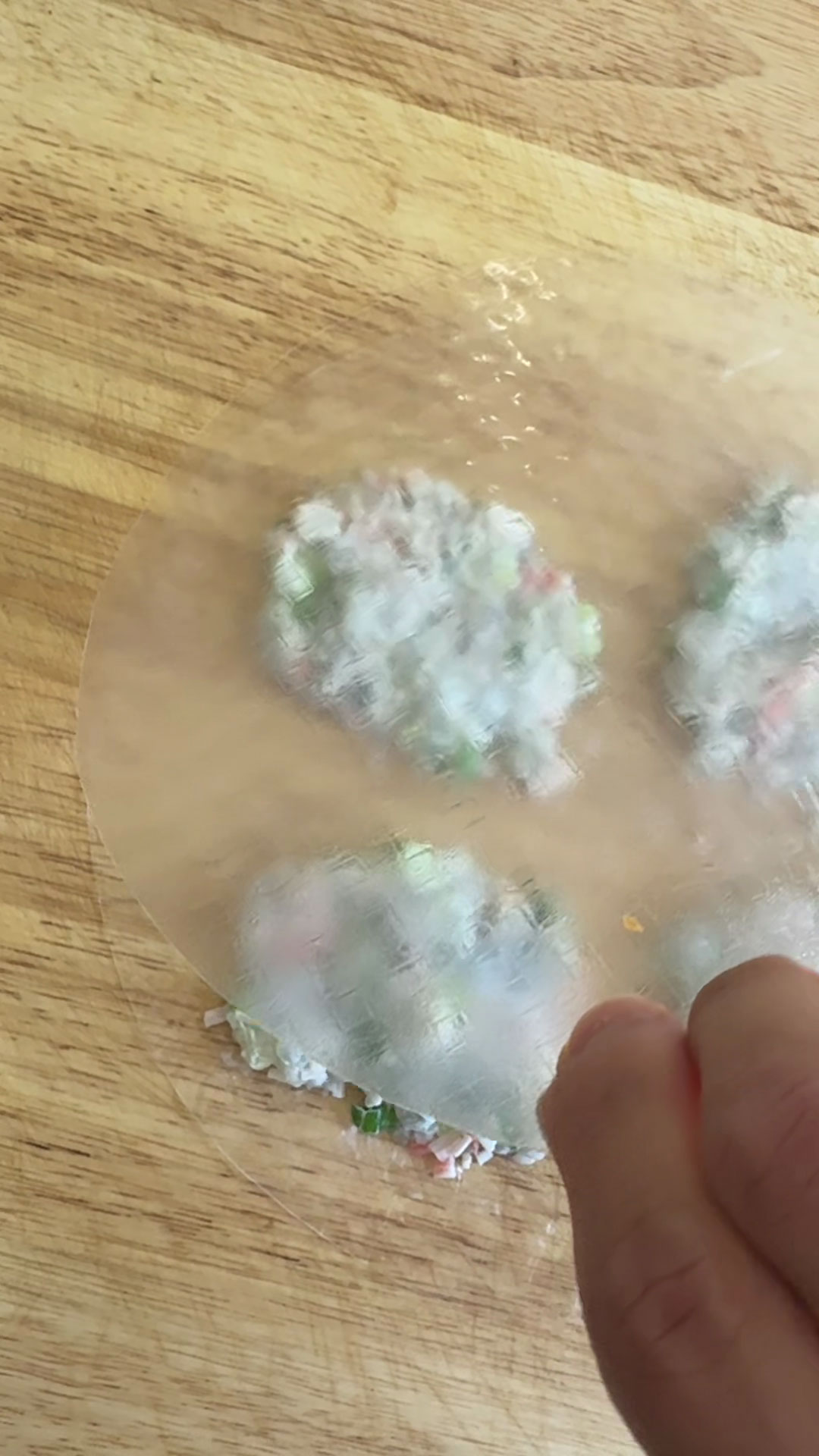Fill the four parts of the rice paper with the shrimp mixture 