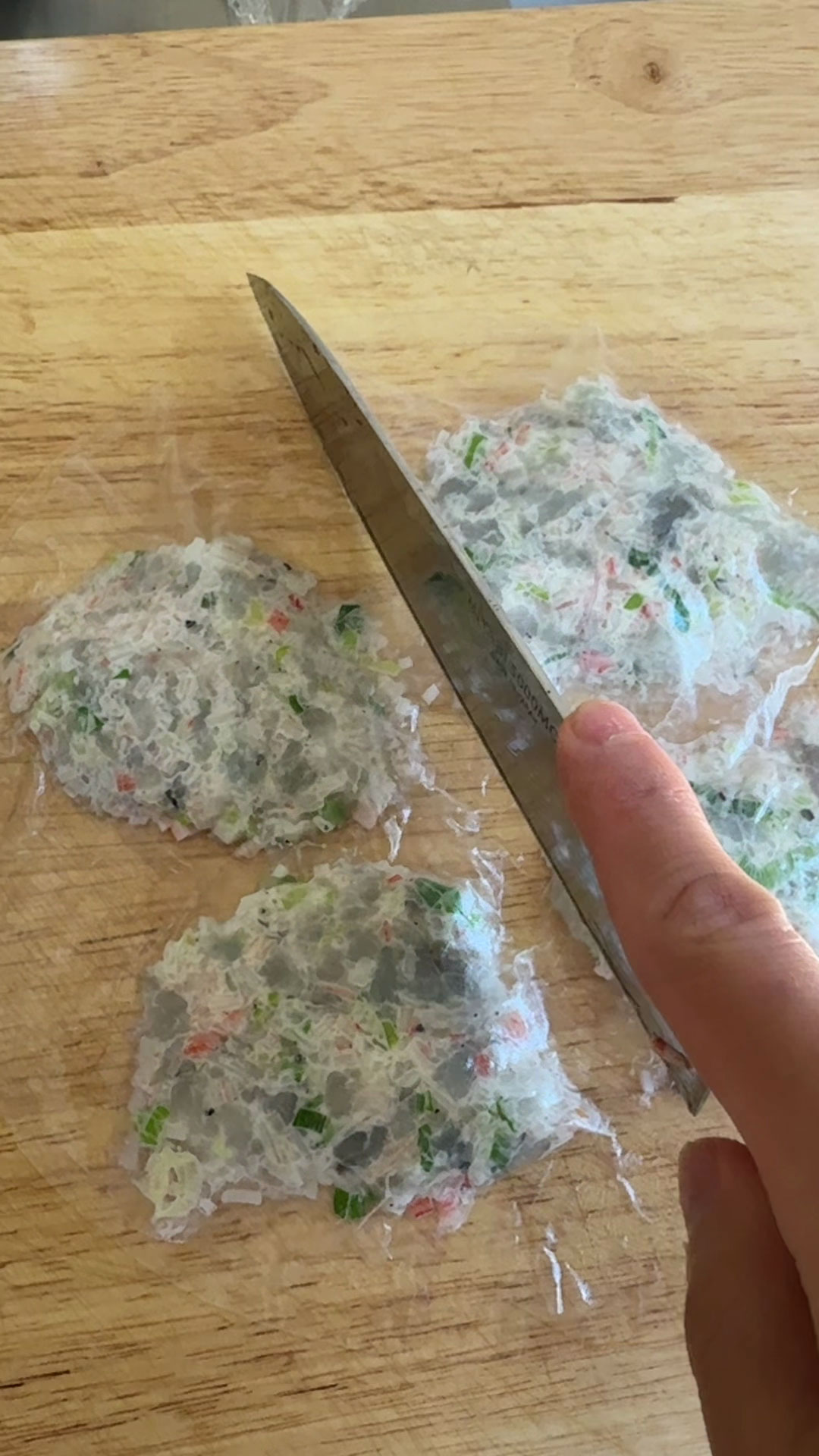 Seal the dumplings with another rice paper and divide it into four 