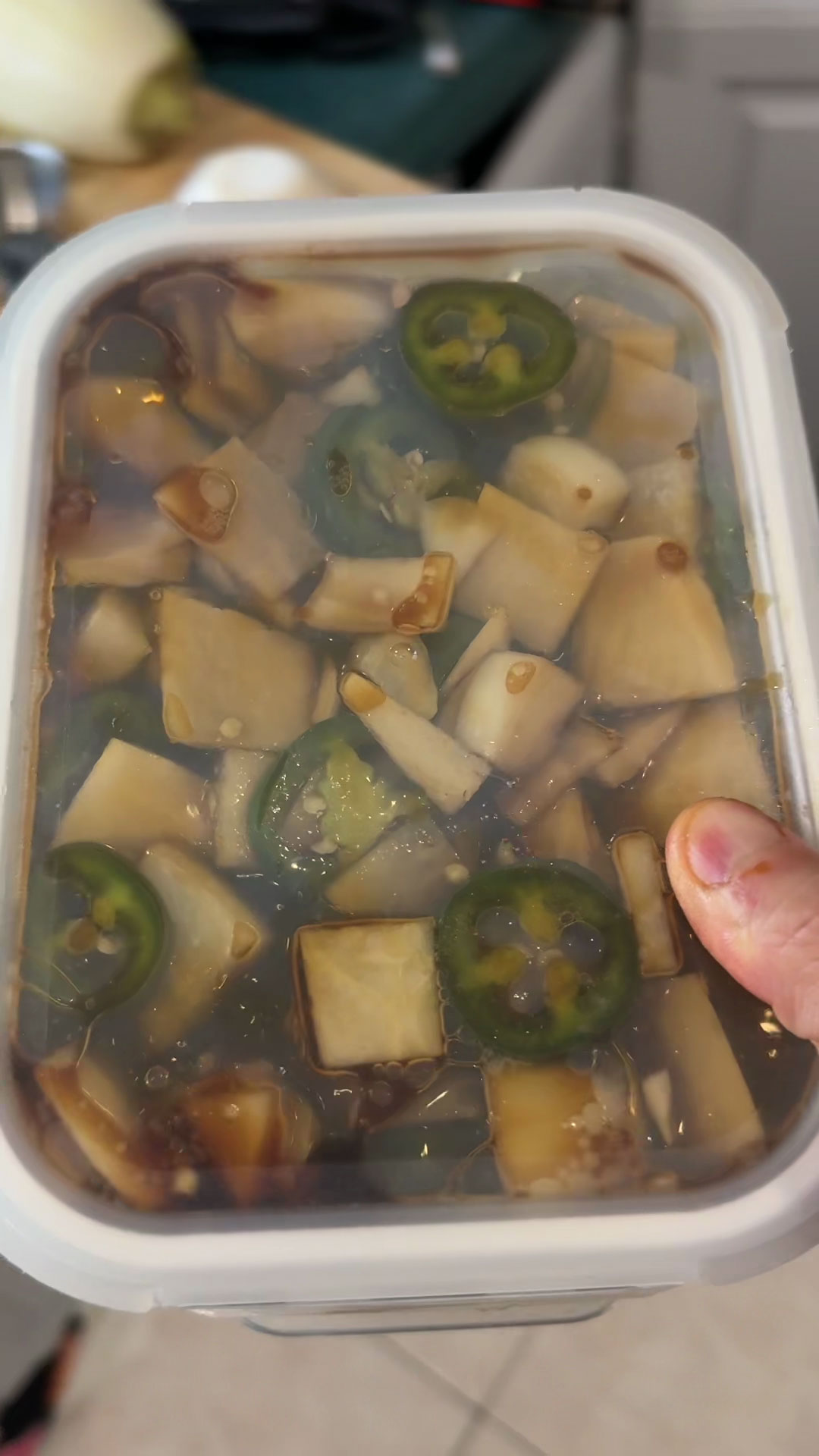 Place pickled radish in a container 